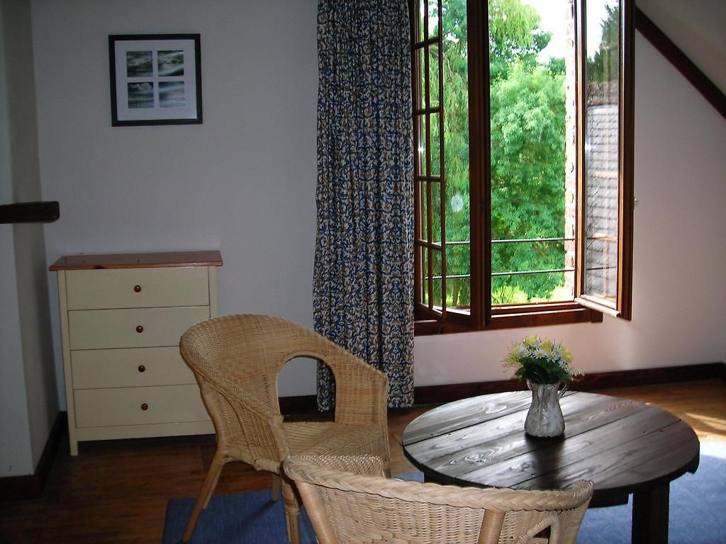 Ellen's Room second floor twin bedroom with iron bed frames at Le Moulin St Blaise