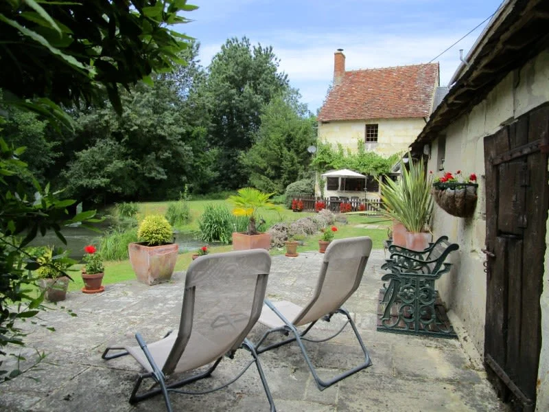Gite La Maison du Frere private riverside deck with sun loungers, Moulin St Blaise